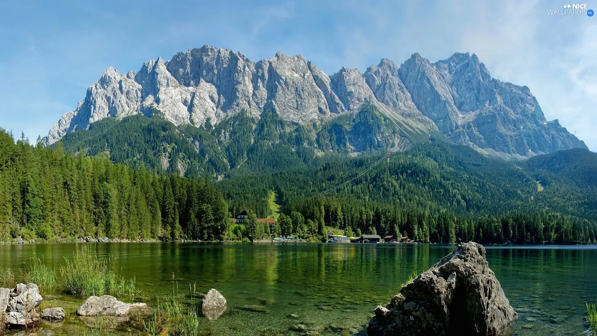 Mountains, buildings, water, forest