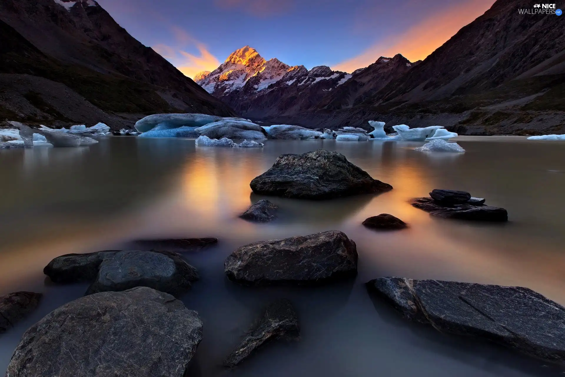 Stones, Mountains, light breaking through sky, lake