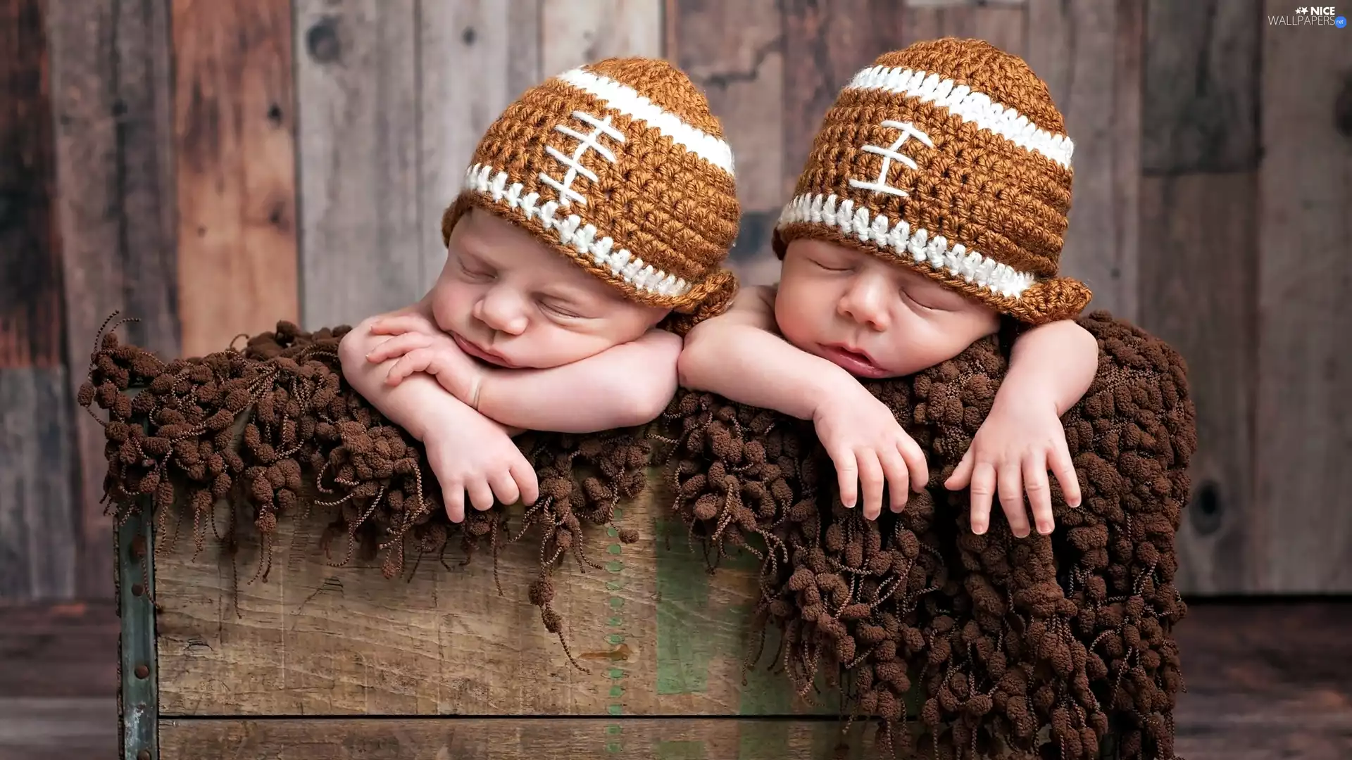 Two cars, box, caps, infants