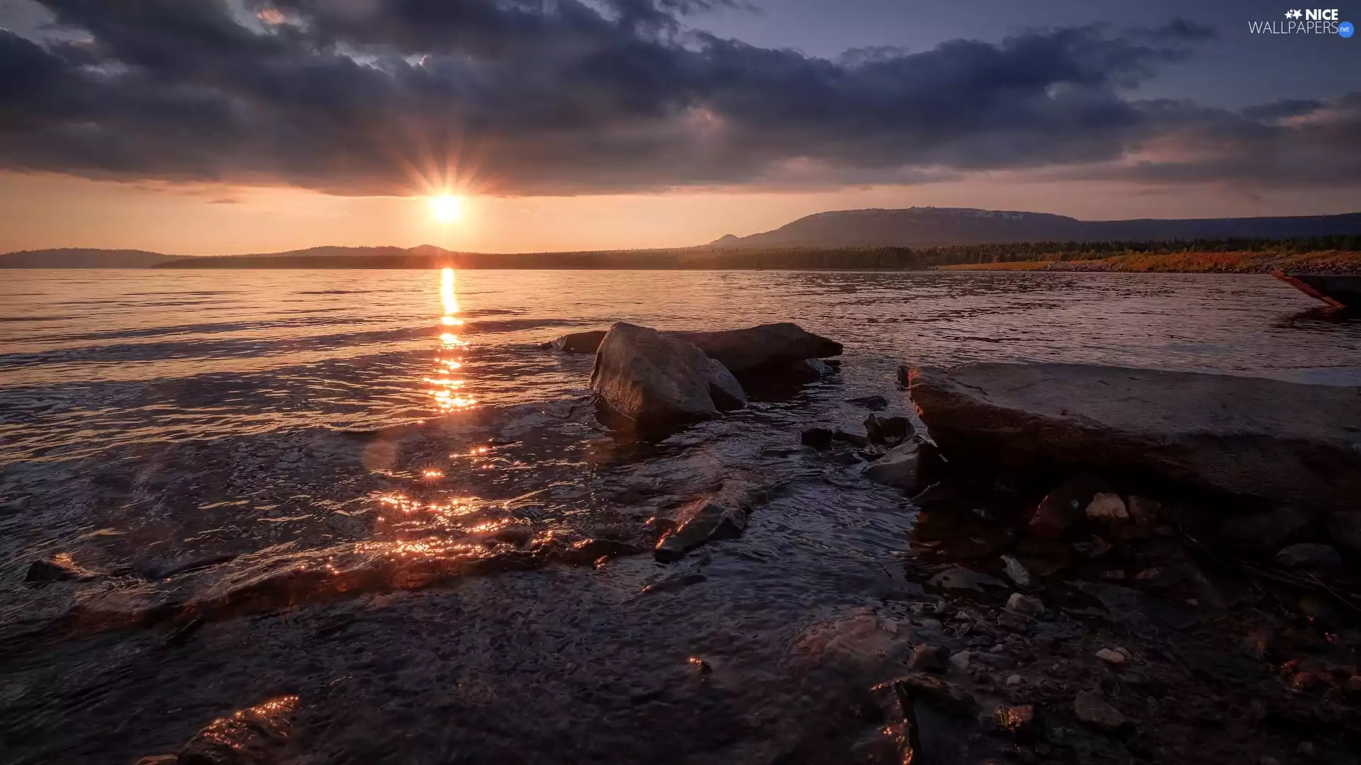 Mountains, rays of the Sun, clouds, Stones, lake