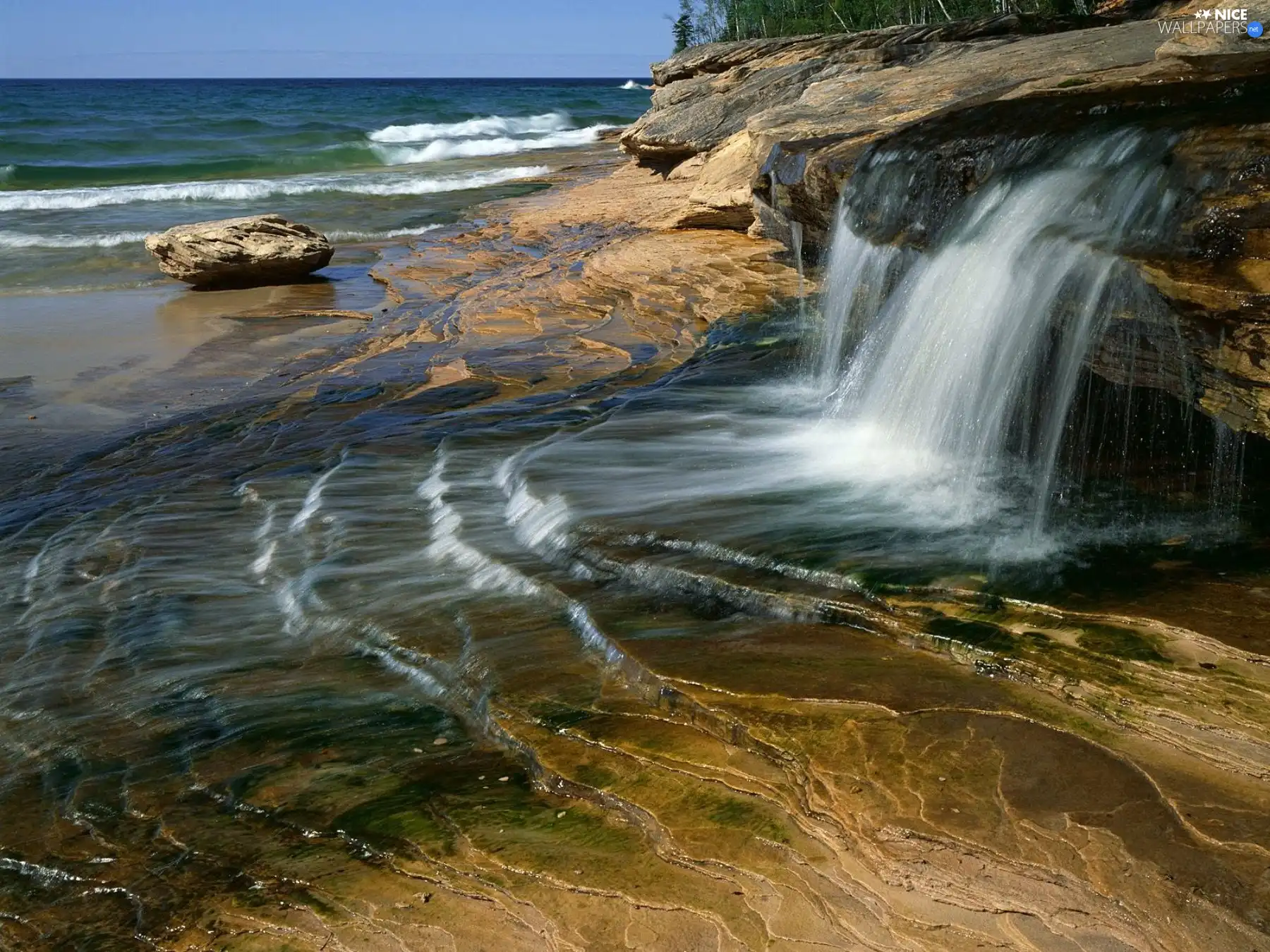 Ocean, rocks, waterfall