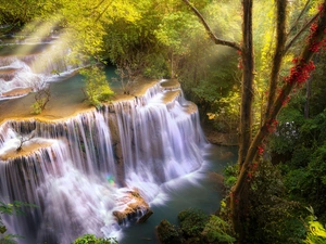 Thailand, Huai Mae Khamin Waterfall, light breaking through sky, Kanchanaburi Province