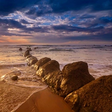 Stones, horizon, clouds, sea