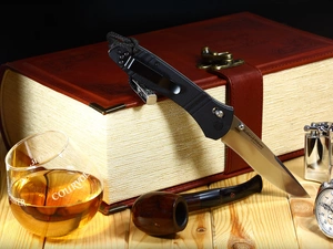 pipe, knife, A glass, book, Whisky