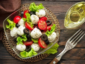tomatoes, salad, oil, lettuce, bowl, Wicker Stand, tablecloth, olives, Mozzarella Cheese, boarding, fork