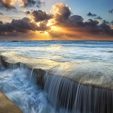 sea, cascade, rays of the Sun, rocks