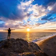 clouds, Great Sunsets, sea, Rocks, a man