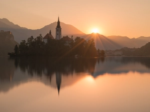 Blejski Otok Island, Church of the Annunciation of the Virgin Mary, reflection, Mountains, Sunrise, Lake Bled, Slovenia, Julian Alps